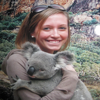 Student in Australia holding Koala