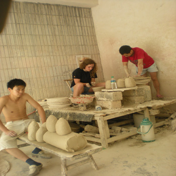 Student in China making Ceramics with Chinese