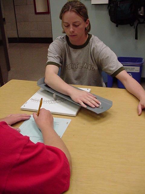 Student using kinesthesiometer